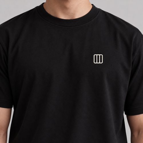 Architect Column Tee in black with white embroidered column icon
