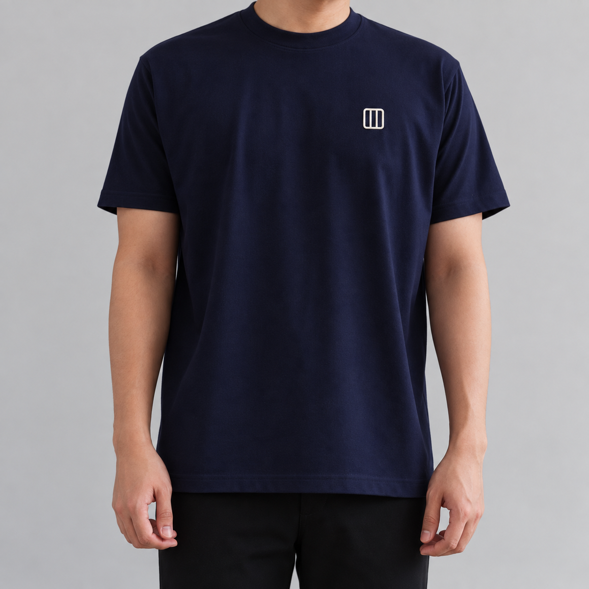 Architect Column Tee in navy with white embroidered column icon