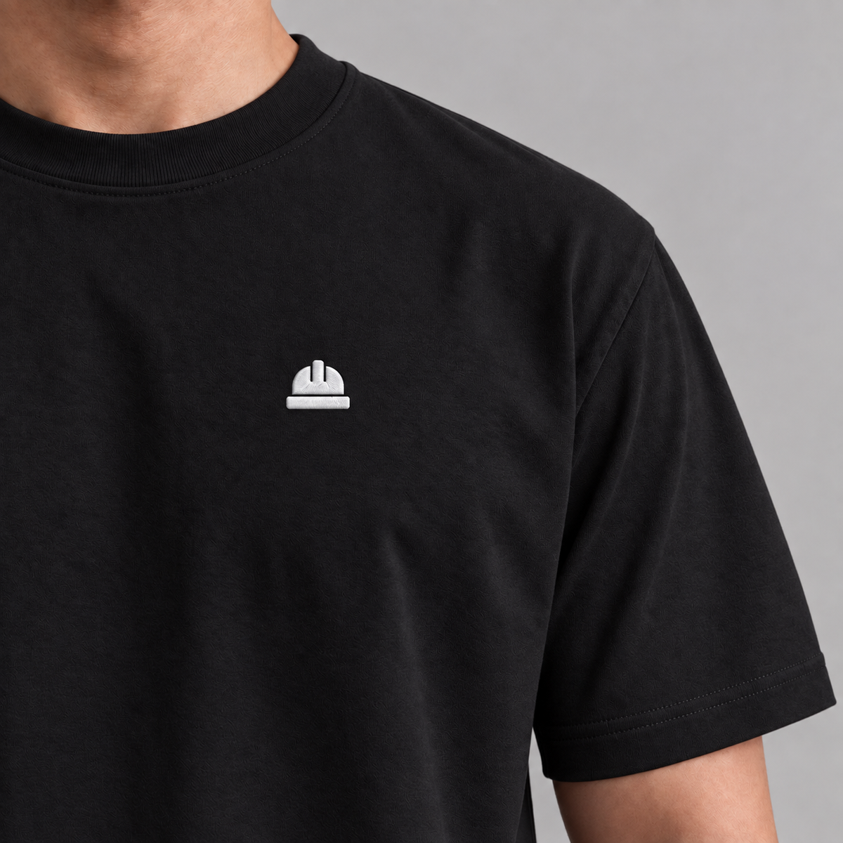 Architect Hard Hat Tee in black with clean filled white embroidery