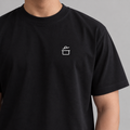 Chef Pan Tee in black with white embroidered cooking pot