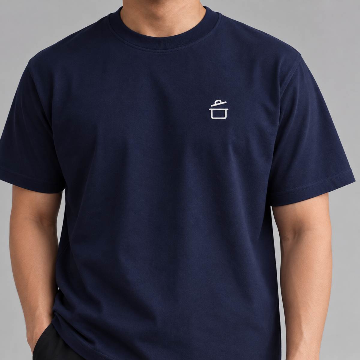 Chef Pan Tee in navy with white embroidered cooking pot