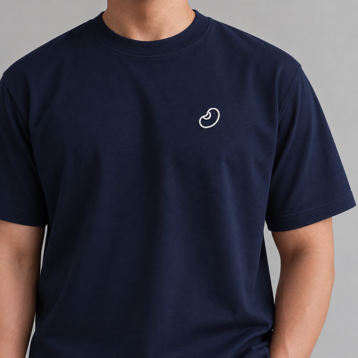 Coffee Bean Tee in navy with white embroidered coffee bean