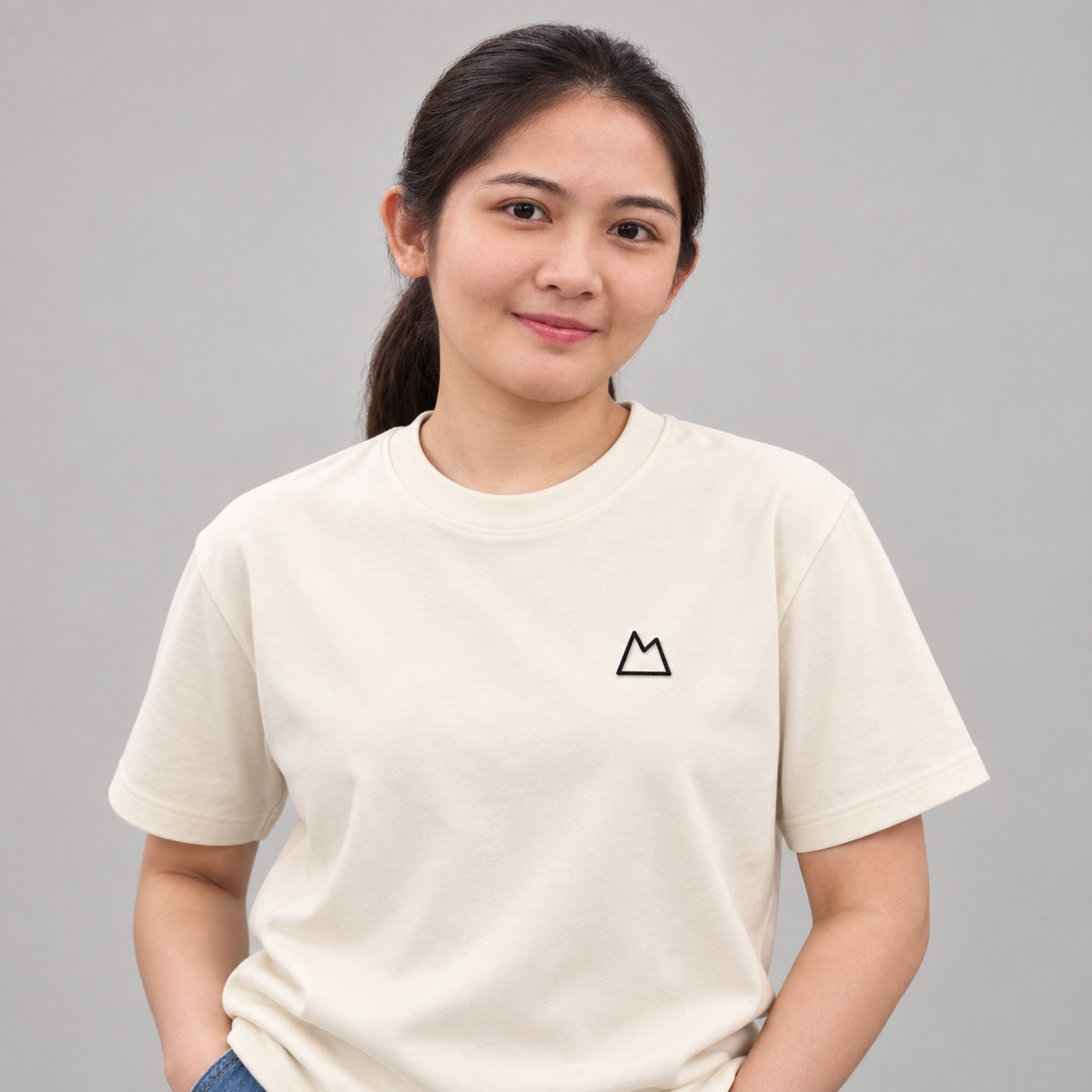 Cyclist Mountain Tee in cream with charcoal embroidered mountain