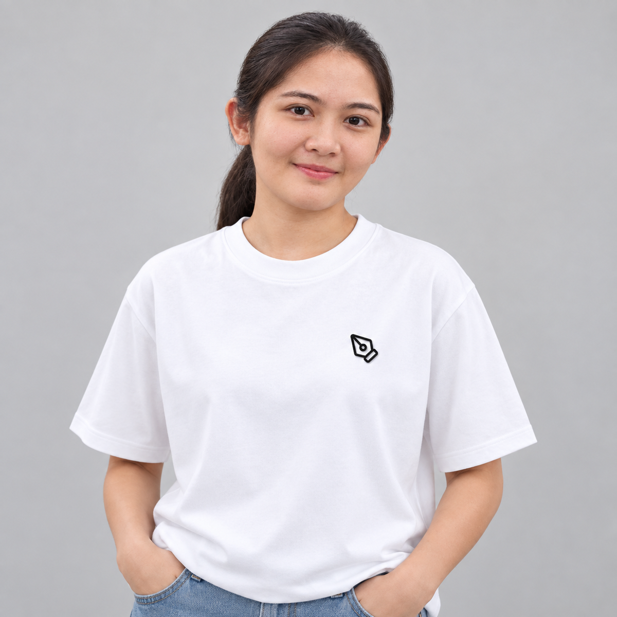 Designer Pen Tool Tee in White with embroidered pen tool icon