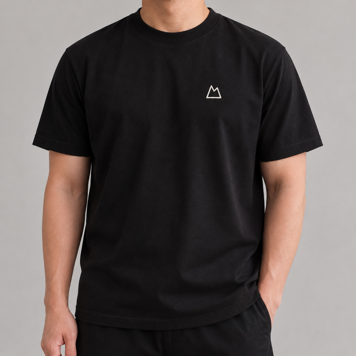 Camper Mountain Tee in black with white mountain embroidery